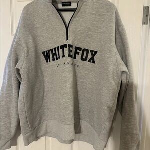 Gray women’s white fox pull over